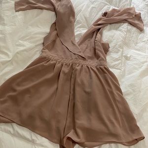 Sexy ASTR open back romper